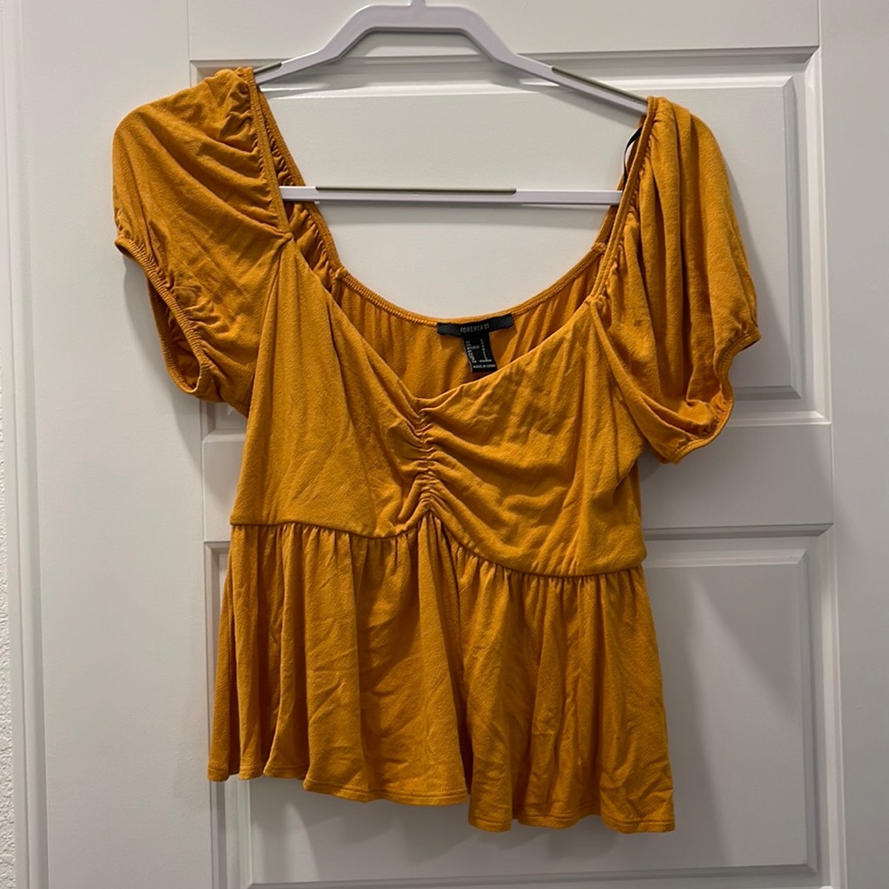 Large orangey mustard top